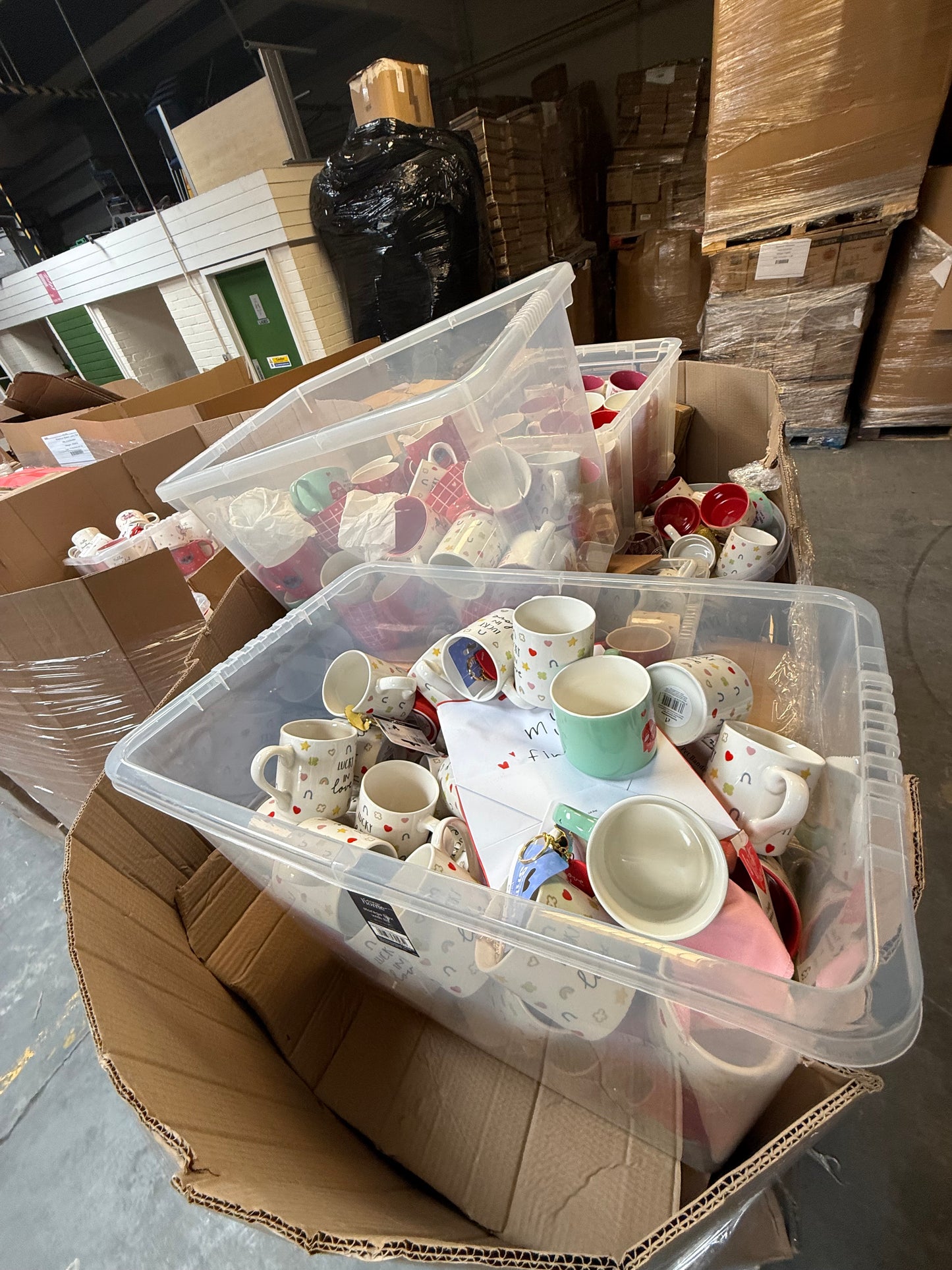 Bulk containers of assorted seasonal mugs wholesale pallet ready for distribution and retail buyers