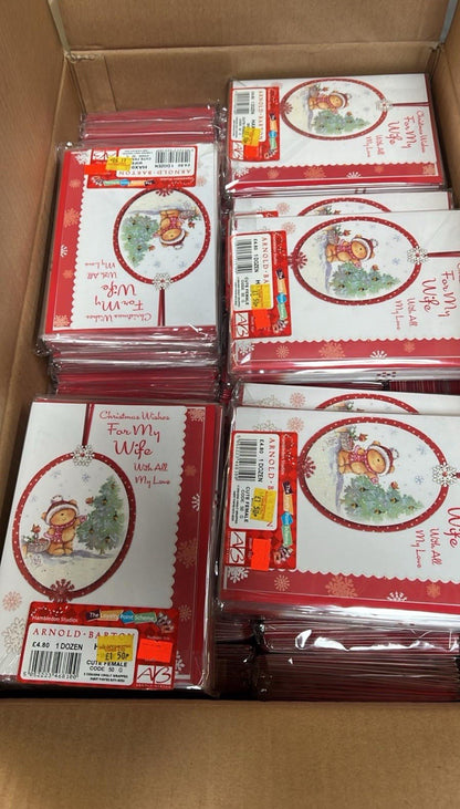 Box of Christmas cards with red envelopes and festive bear design by Ironbridge and Sons Ltd bulk greeting cards wholesale