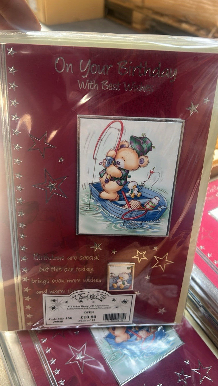 Pack of Ironbridge and Sons Ltd birthday cards showing teddy bear fishing in a boat on maroon cover bulk greeting cards wholesale
