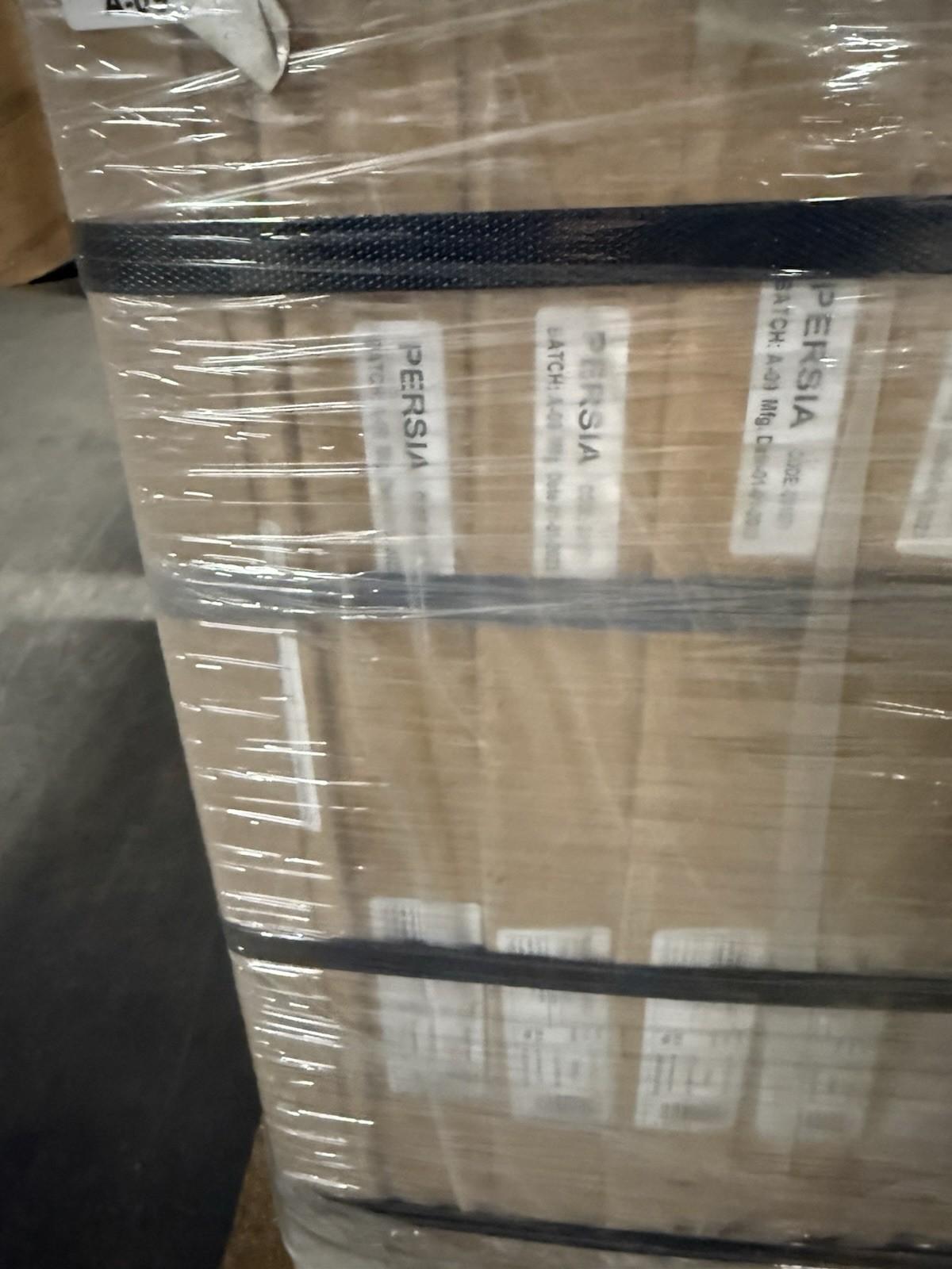 Pallet of Beige outdoor porcelain floor tiles packaged securely for shipping by Ironbridge & Sons Ltd