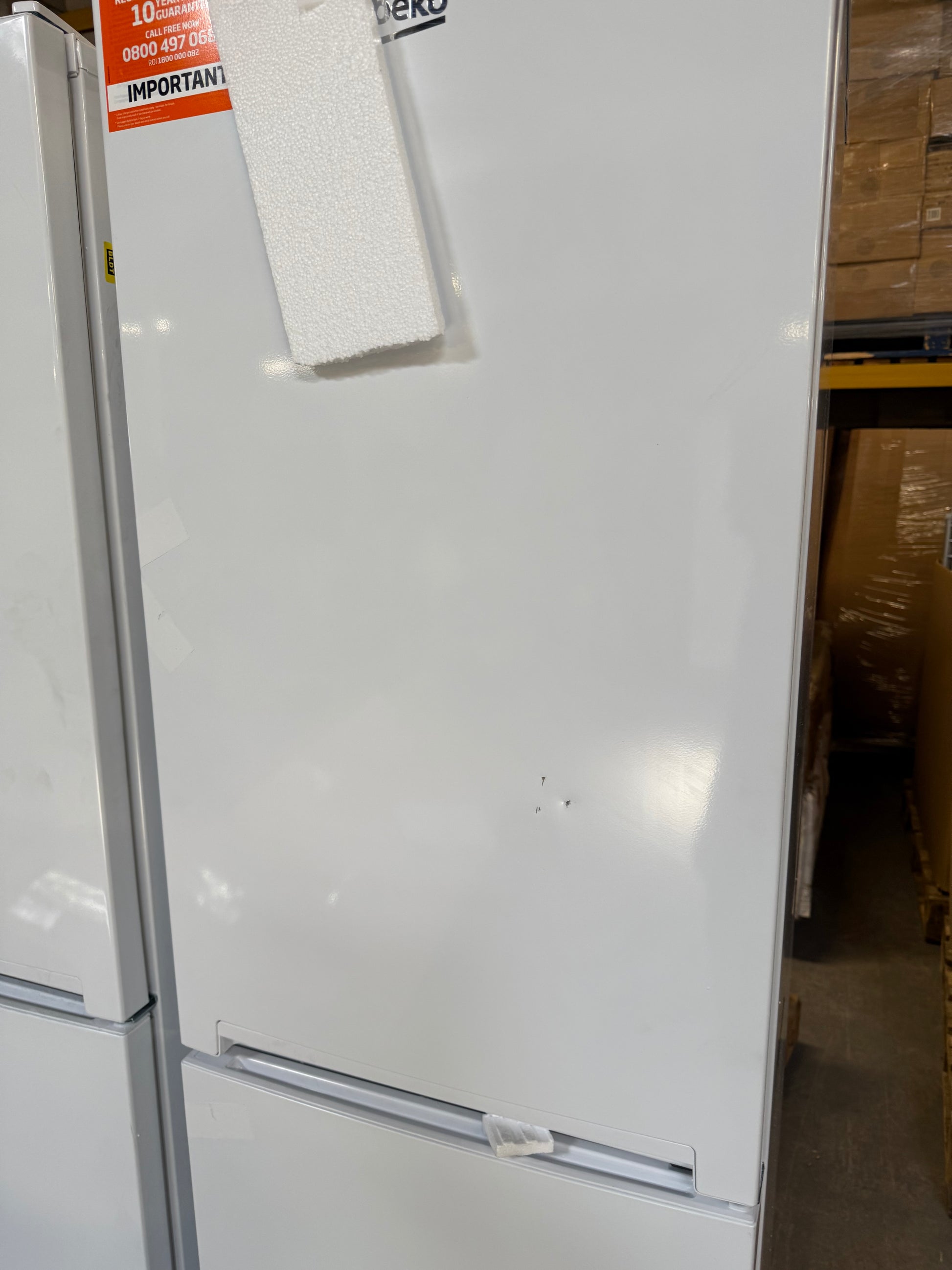 Beko CFG4582W frost free fridge freezer in white with a sleek design and spacious storage