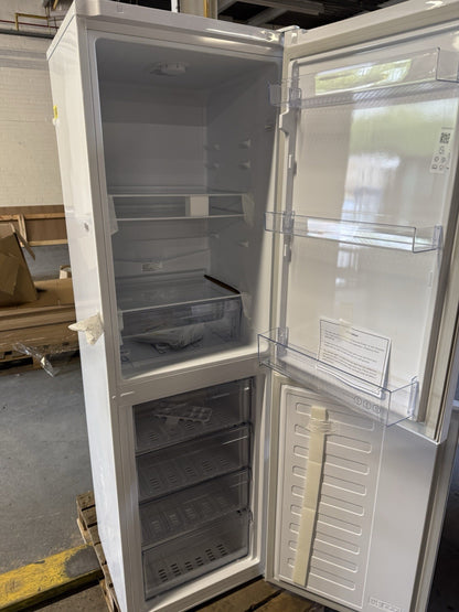 Beko CFG4582W frost free fridge freezer with spacious interior and adjustable shelves for efficient storage.