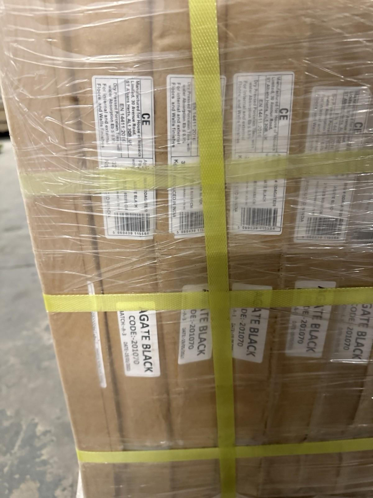 Packaged black outdoor porcelain floor tiles from Ironbridge & Sons Ltd ready for installation