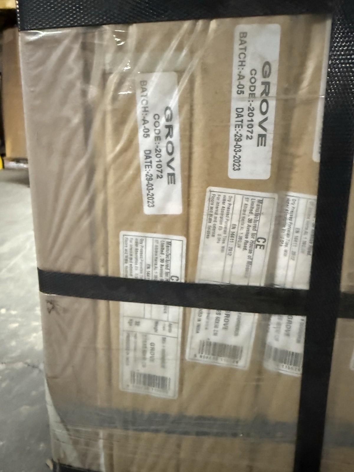 Stacked boxes of Cream Outdoor Porcelain Floor Tiles from Ironbridge & Sons Ltd ready for shipping