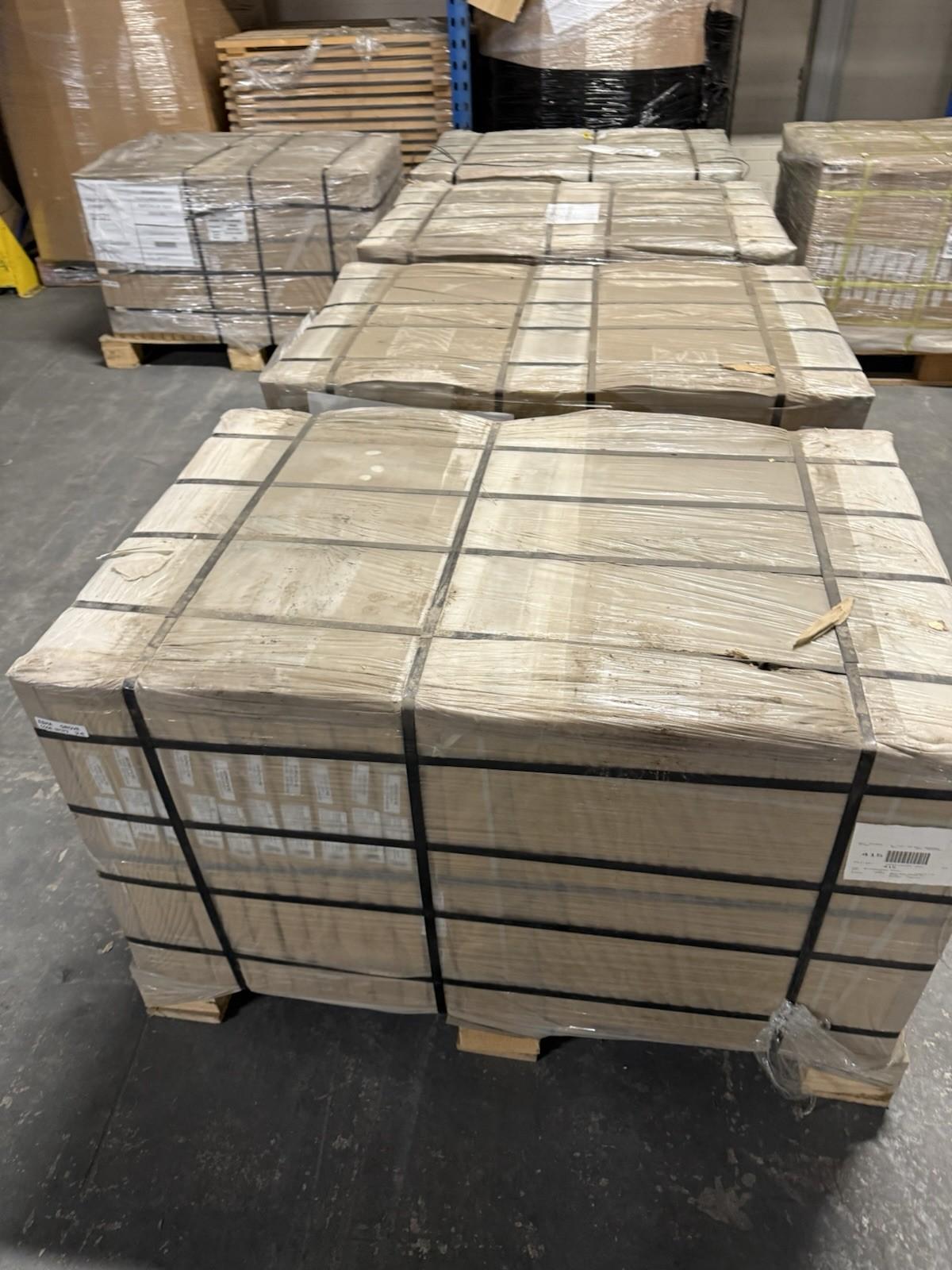 Pallets of Cream Outdoor Porcelain Floor Tiles ready for delivery and installation in outdoor spaces