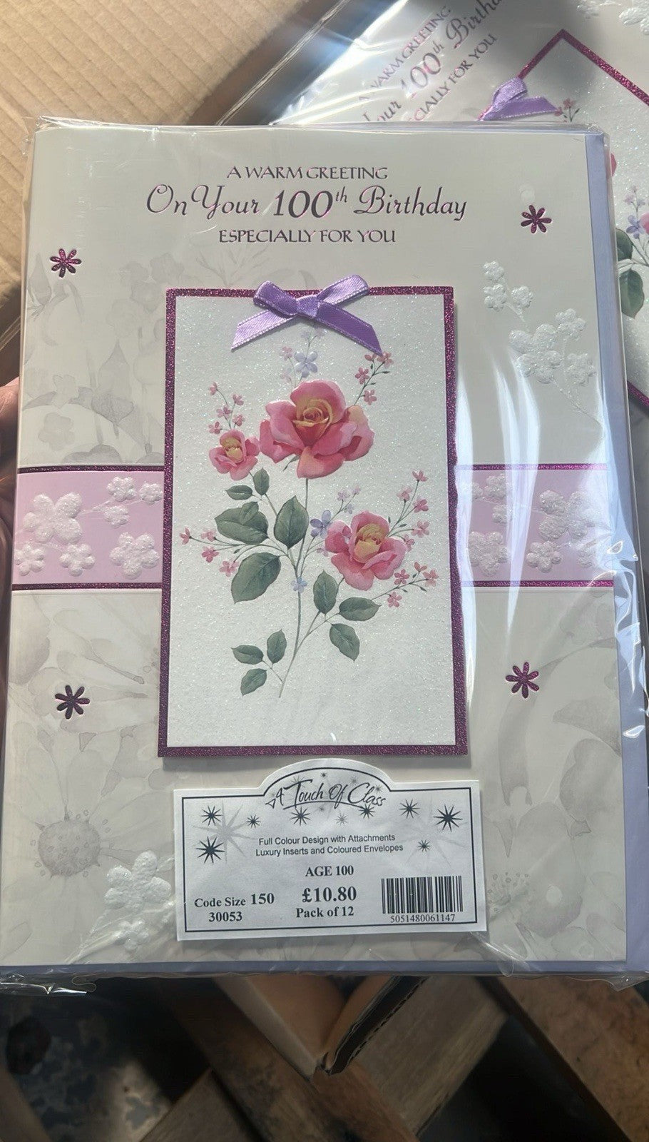Pack of 100th birthday floral cards with pink roses and purple bow embossed design bulk greeting cards wholesale