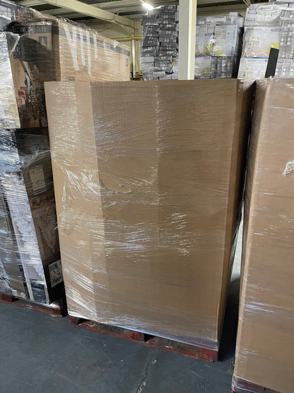 Wholesale Christmas tree pallets wrapped in stretch film for seasonal retail supply.
